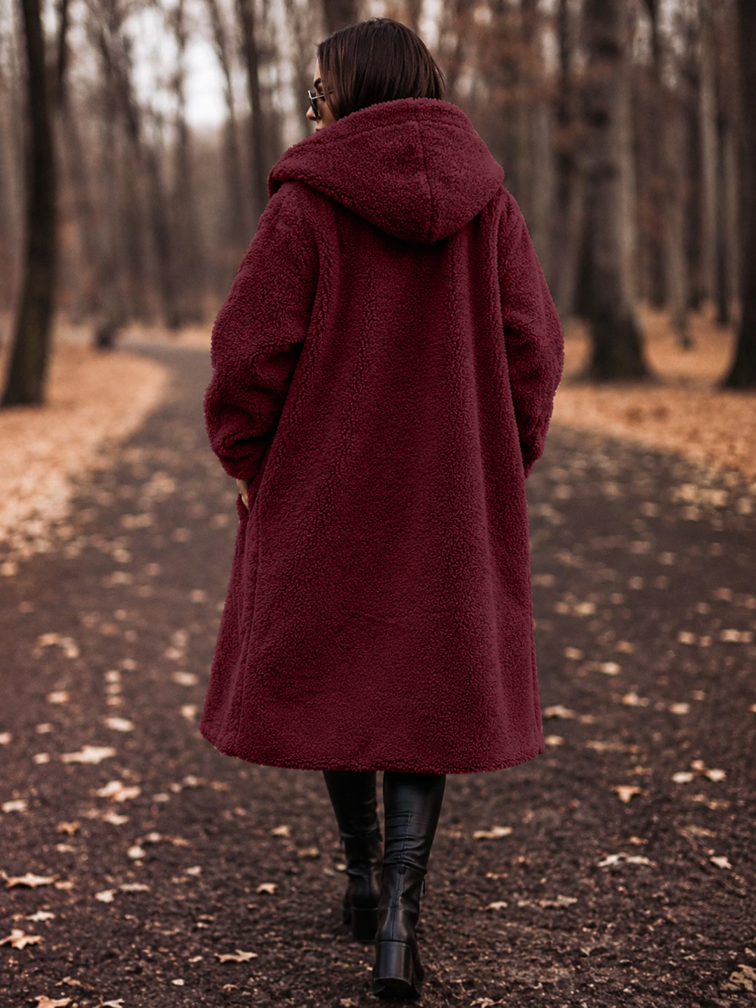 Elegant women's hooded knee-length coat, a warm and chic choice for winter and fall outerwear.