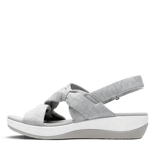 Comfortable & stylish women's orthopedic sandals with robust arch support, great for daily walks.