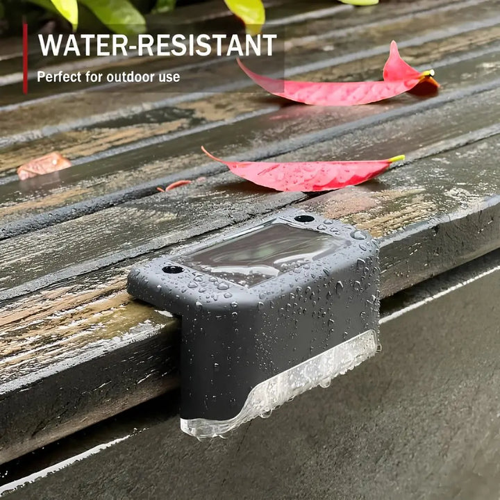 Compact Nvroome outdoor solar step light with warm glow LED, ideal for modern garden decor.