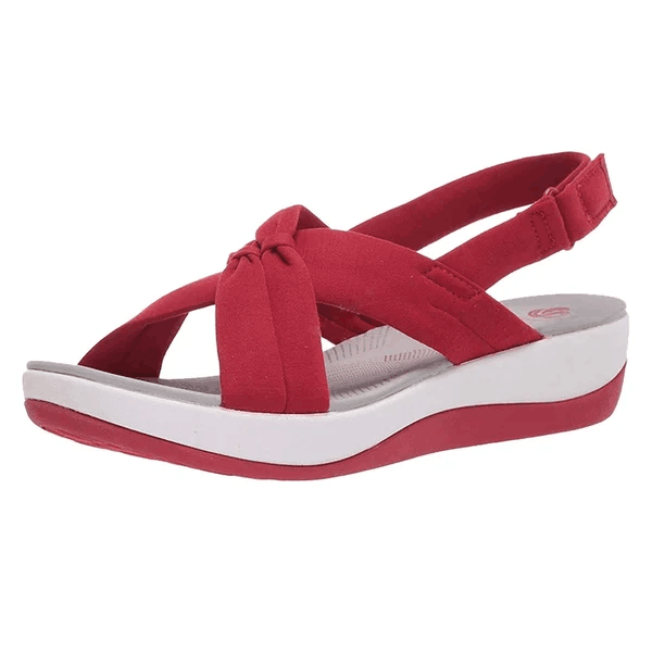 Comfortable women's sandals with orthopedic arch support for improved foot health & daily wear.