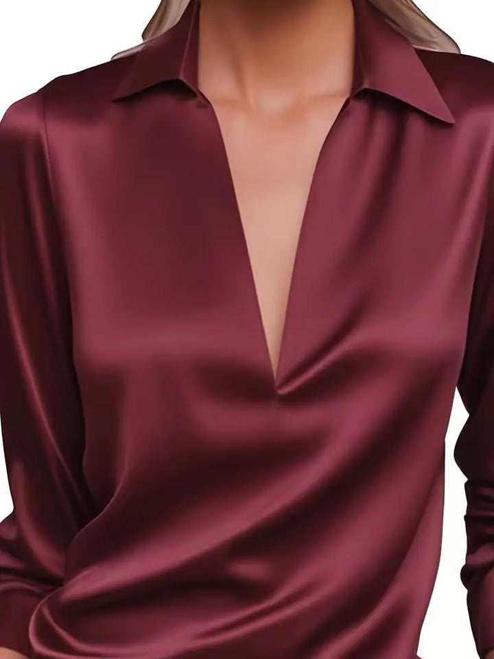 Sophisticated V-neck blouse, women's long sleeve, flowing fit for everyday luxury.
