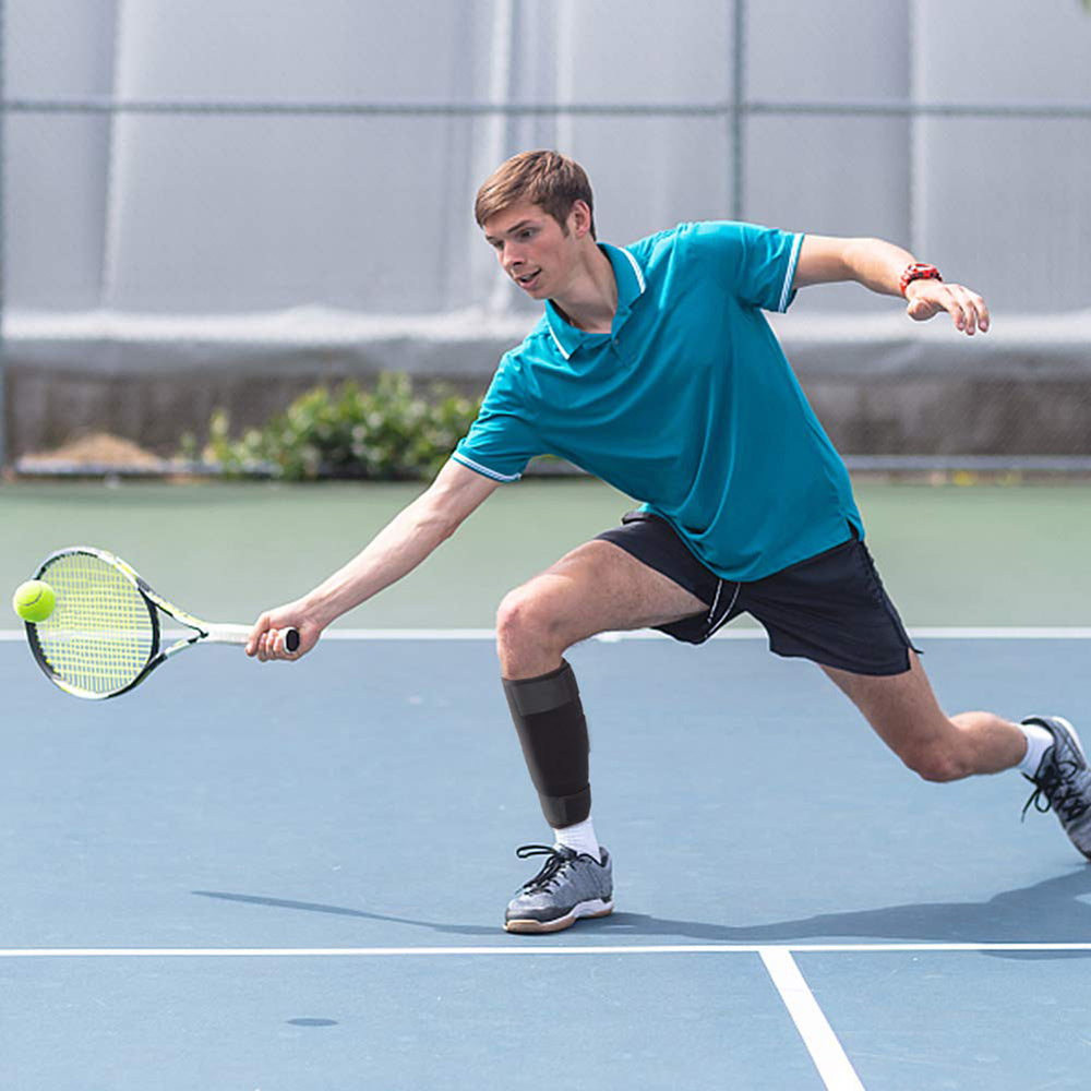 Black calf brace for men & women, offering excellent support for recovery & sports.
