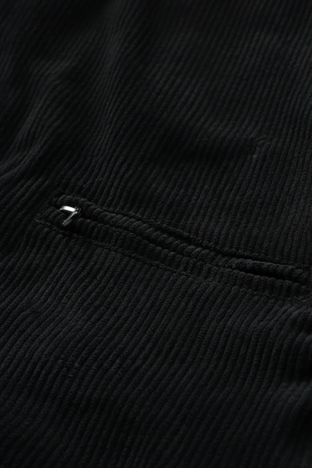 Men's black corduroy jacket, a classic casual button-up for versatile everyday wear in fall and spring.