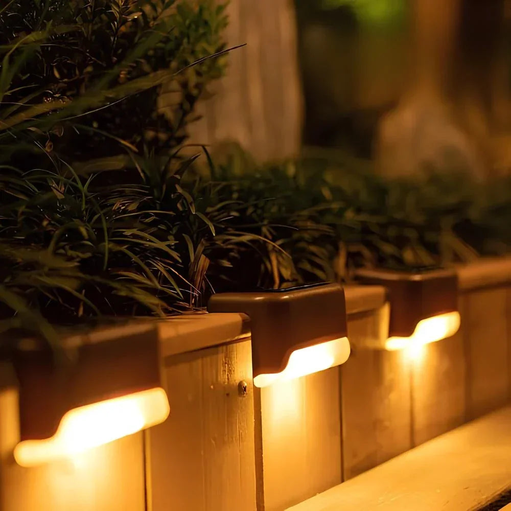 Outdoor solar step lights from Nvroome, showcasing durable, weather-resistant design on a deck.