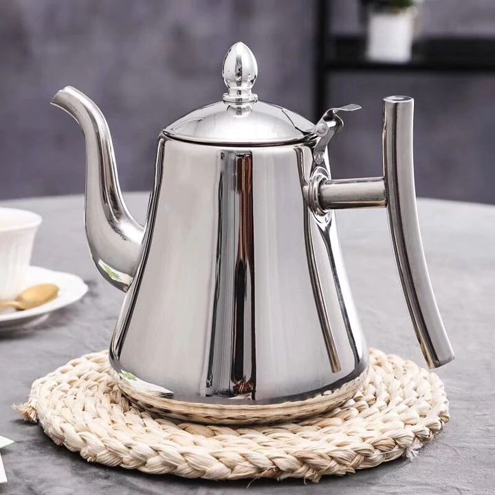 Stainless steel electric kettle with integrated water filter for clean, hot water. Ideal for home kitchens.