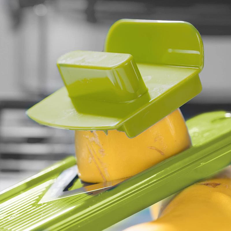 Essential 12-in-1 kitchen tool: vegetable slicer, chopper, dicer, grater for efficient cooking prep.