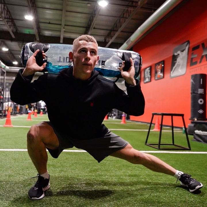 Water power bag for effective strength and balance training. Perfect portable gym for home workouts.
