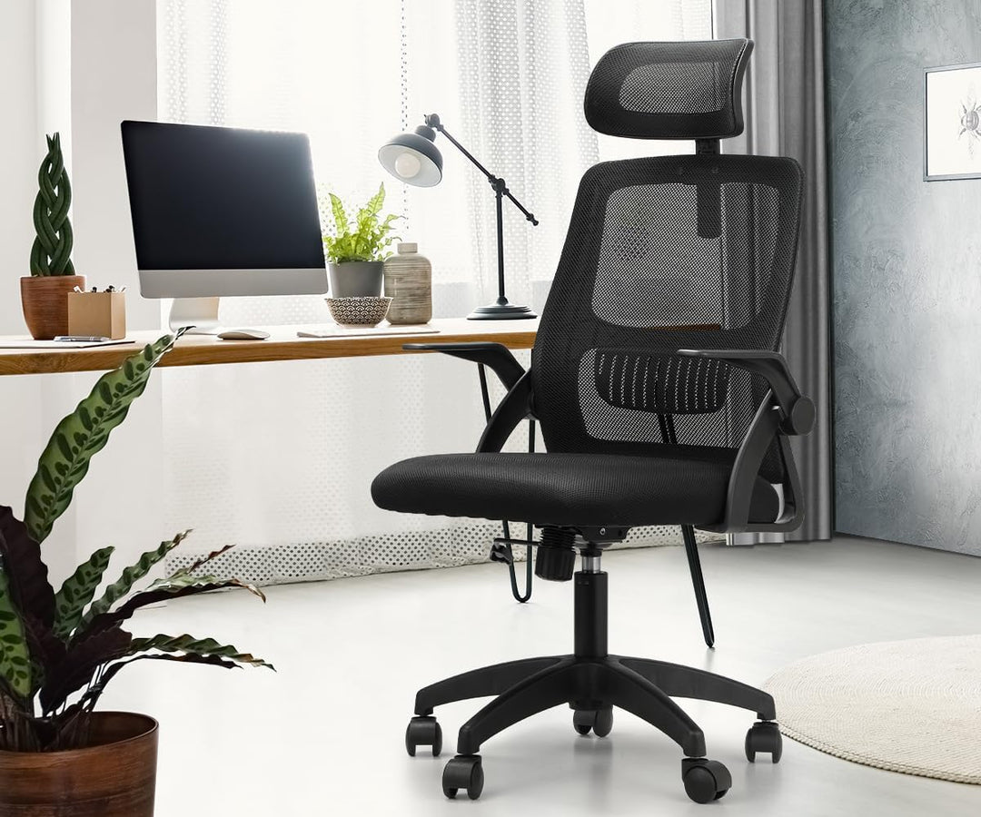 Black ergonomic mesh office chair with adjustable lumbar support, headrest, and tilt function for desk work.