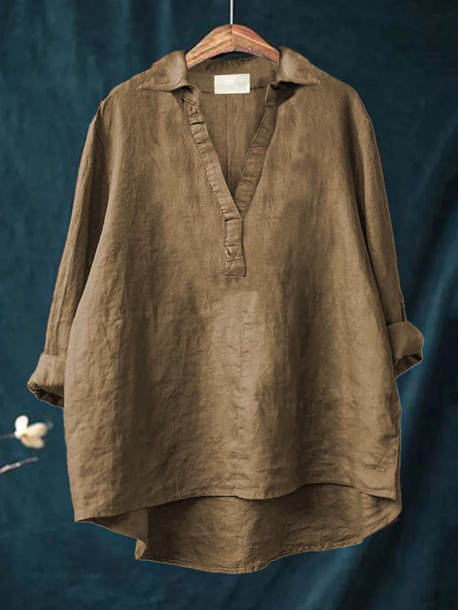 Elegant women's blouse, sophisticated long-sleeve top for professional office wear & chic everyday fashion.