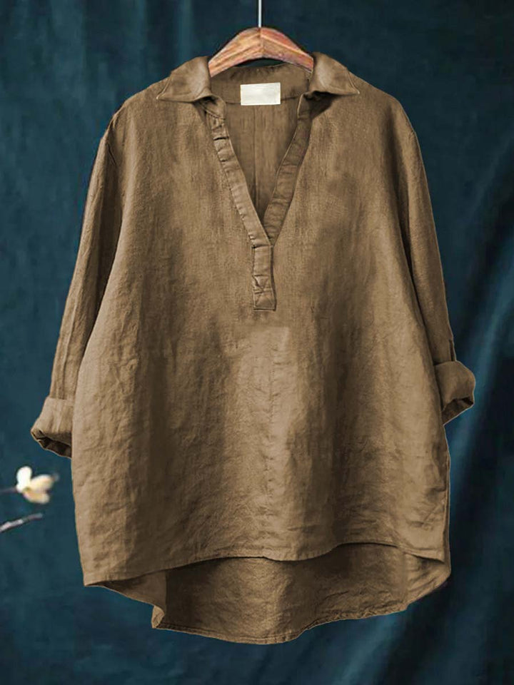 Elegant women's blouse, sophisticated long-sleeve top for professional office wear & chic everyday fashion.