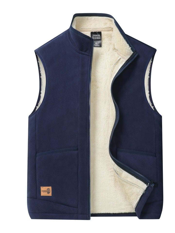 Stylish unisex fleece-lined puffer vest. A comfortable and warm layering piece for outdoor activities.
