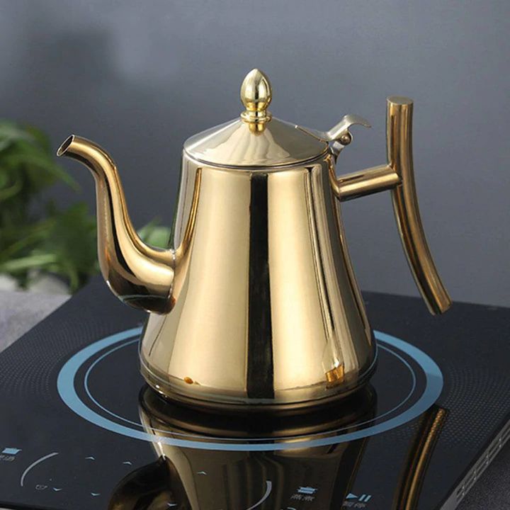Fast boiling stainless steel electric kettle for tea, coffee, & hot water. Essential kitchen appliance.