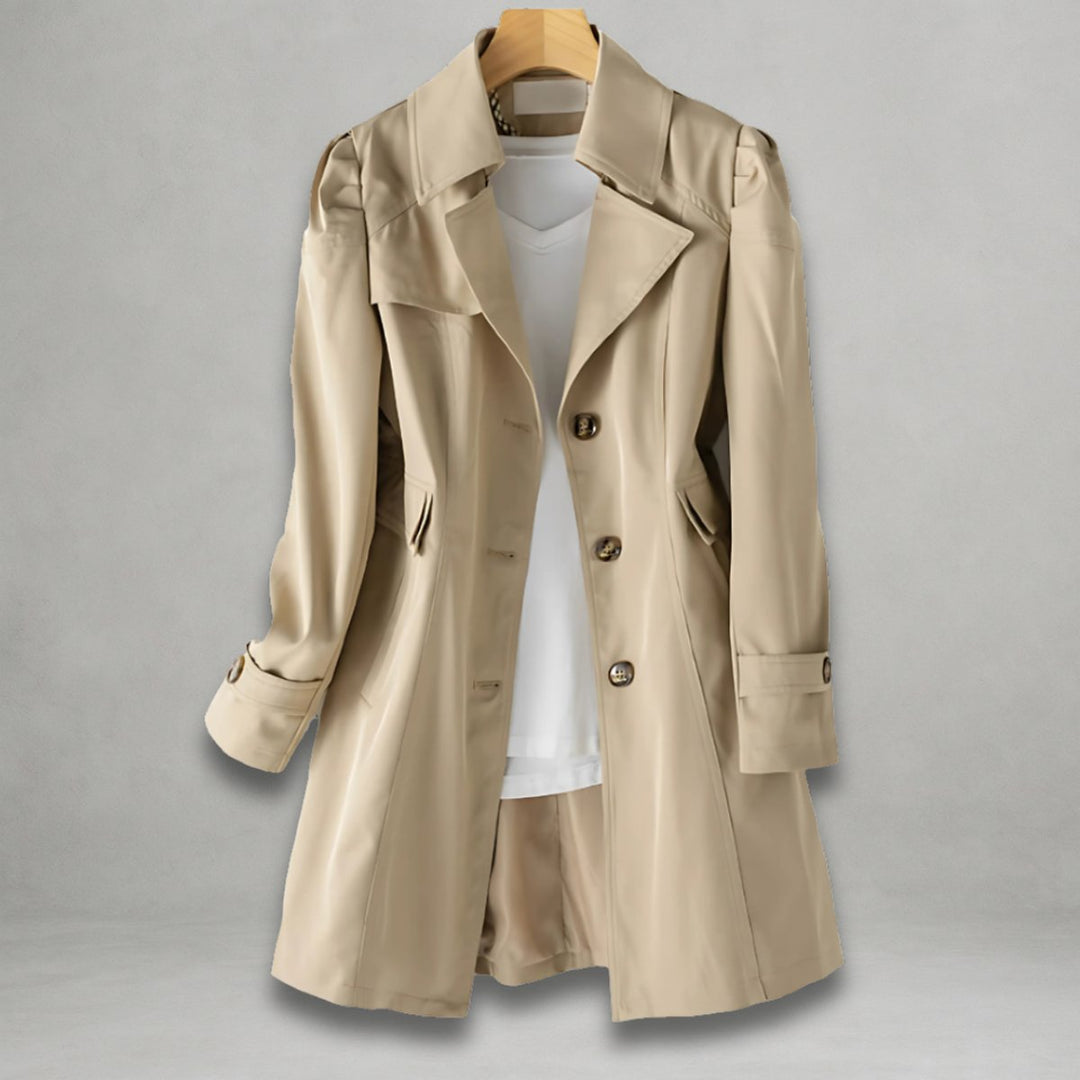 Elegant women's single-breasted trench coat for stylish spring/fall outerwear. Classic, versatile long jacket.