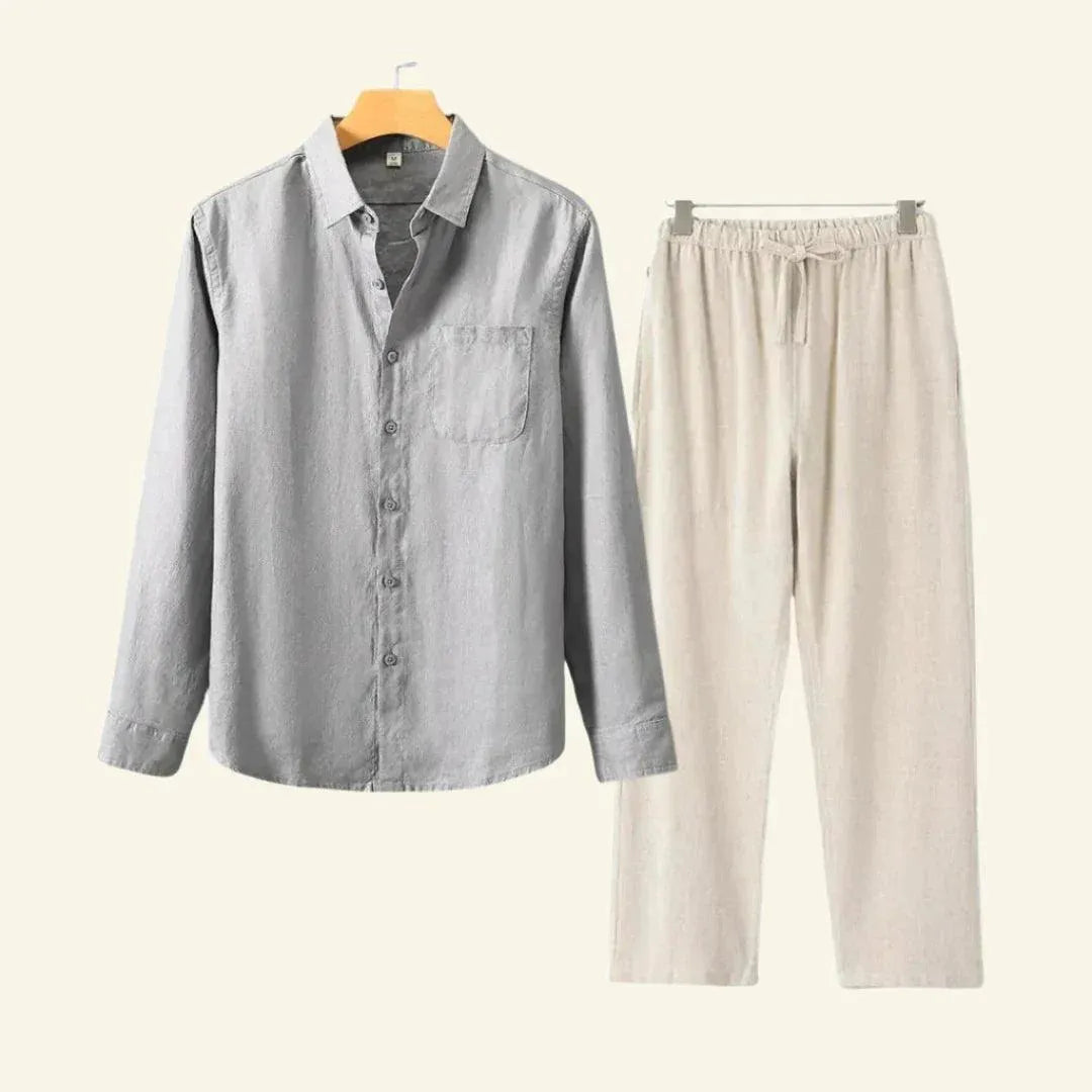 Side view of men's casual two-piece summer outfit; a stylish relaxed-fit shirt and comfortable trousers.