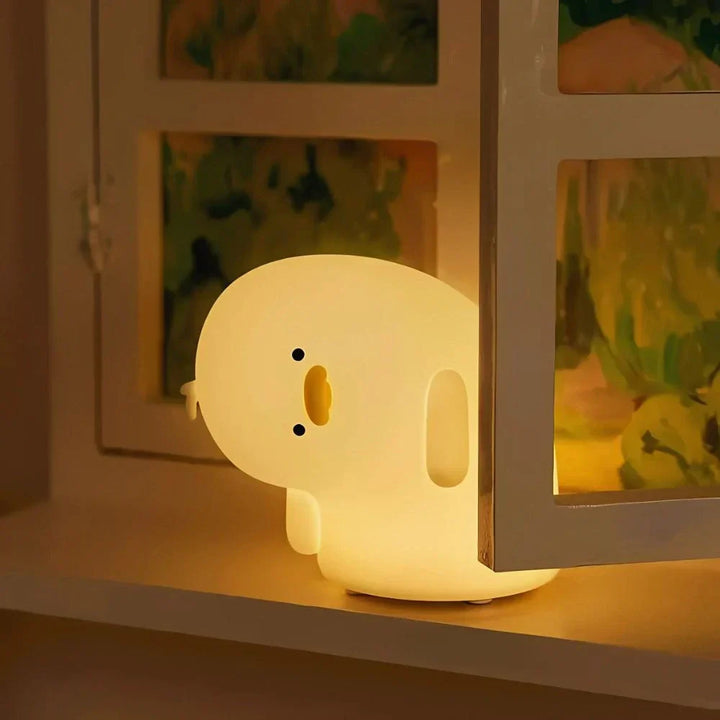 Dimmable LED animal night light with tap control, perfect for nursery or bedside lamp.