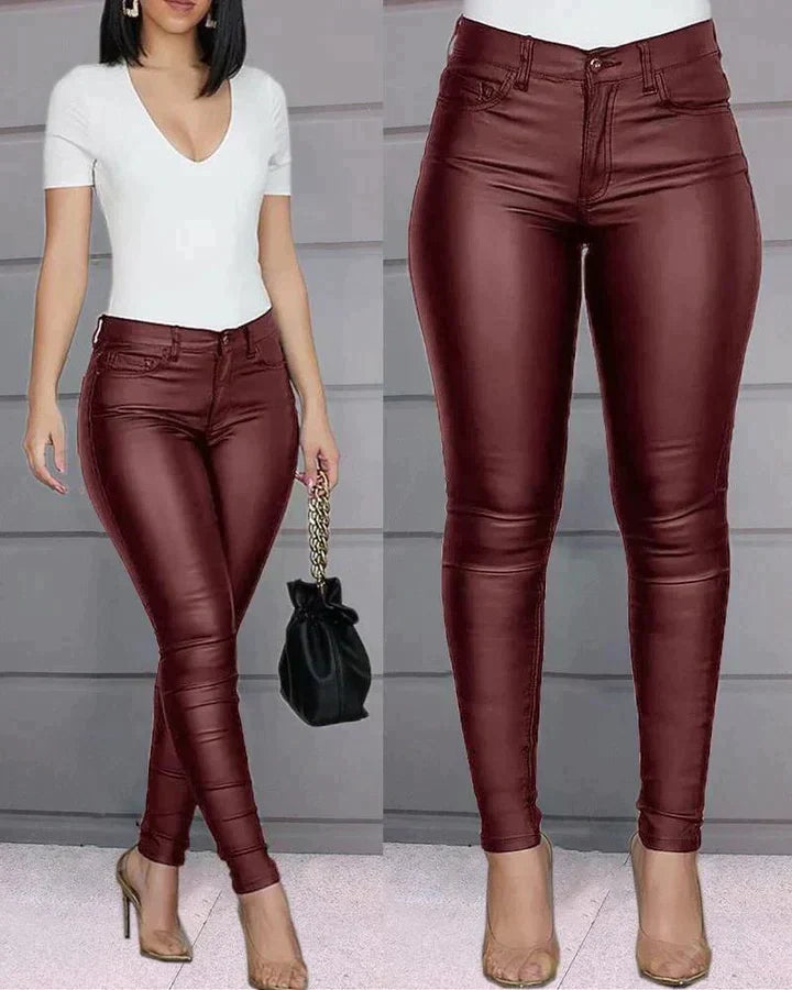 Comfortable women's faux leather stretch pants, ideal for everyday elegance & versatile fashion.