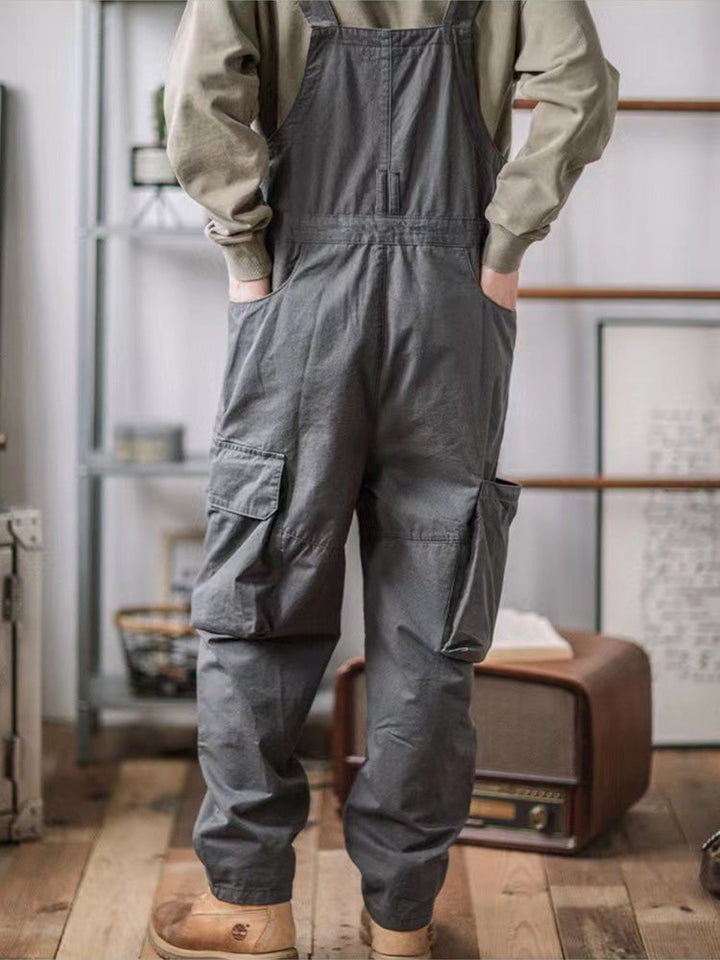 Men's utility overalls with ample pockets, designed for efficient work and casual style.