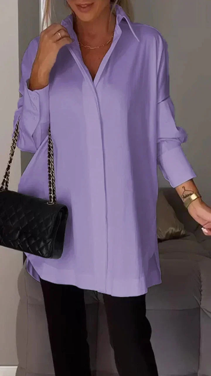 Modern elegant women's oversize blouse. Chic loose fit top, perfect for a comfortable & fashionable look.