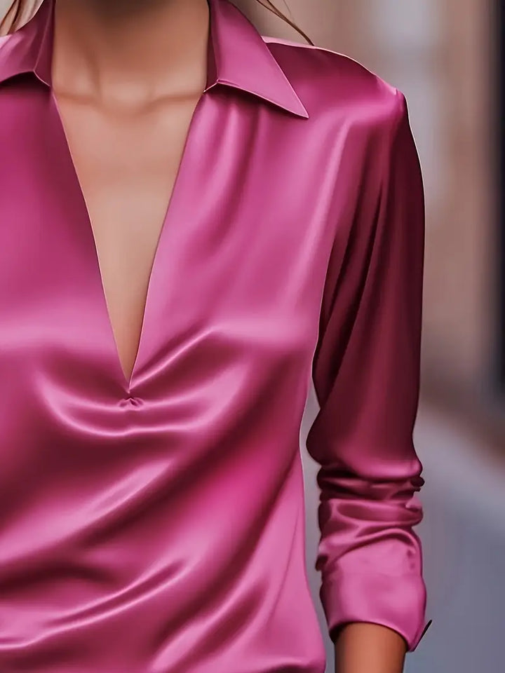 Everyday luxury women's V-neck top, flowing fit for casual chic style.