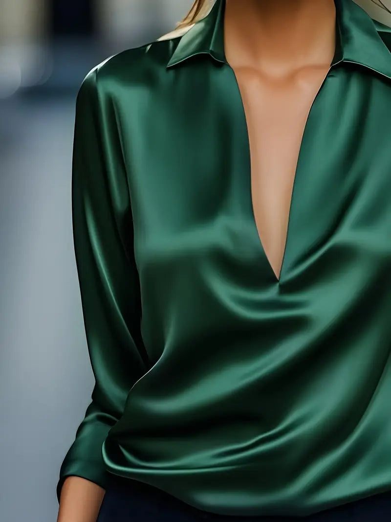 Elegant women's V-neck blouse, flowing fit long sleeve for sophisticated fashion.