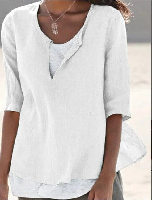 Comfortable women's loose fit knit tunic blouse with V-neck, 3/4 sleeves, ideal for casual and stylish outfits.
