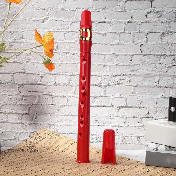 Sleek compact mini saxophone, highly portable and includes an alto mouthpiece for musicians.