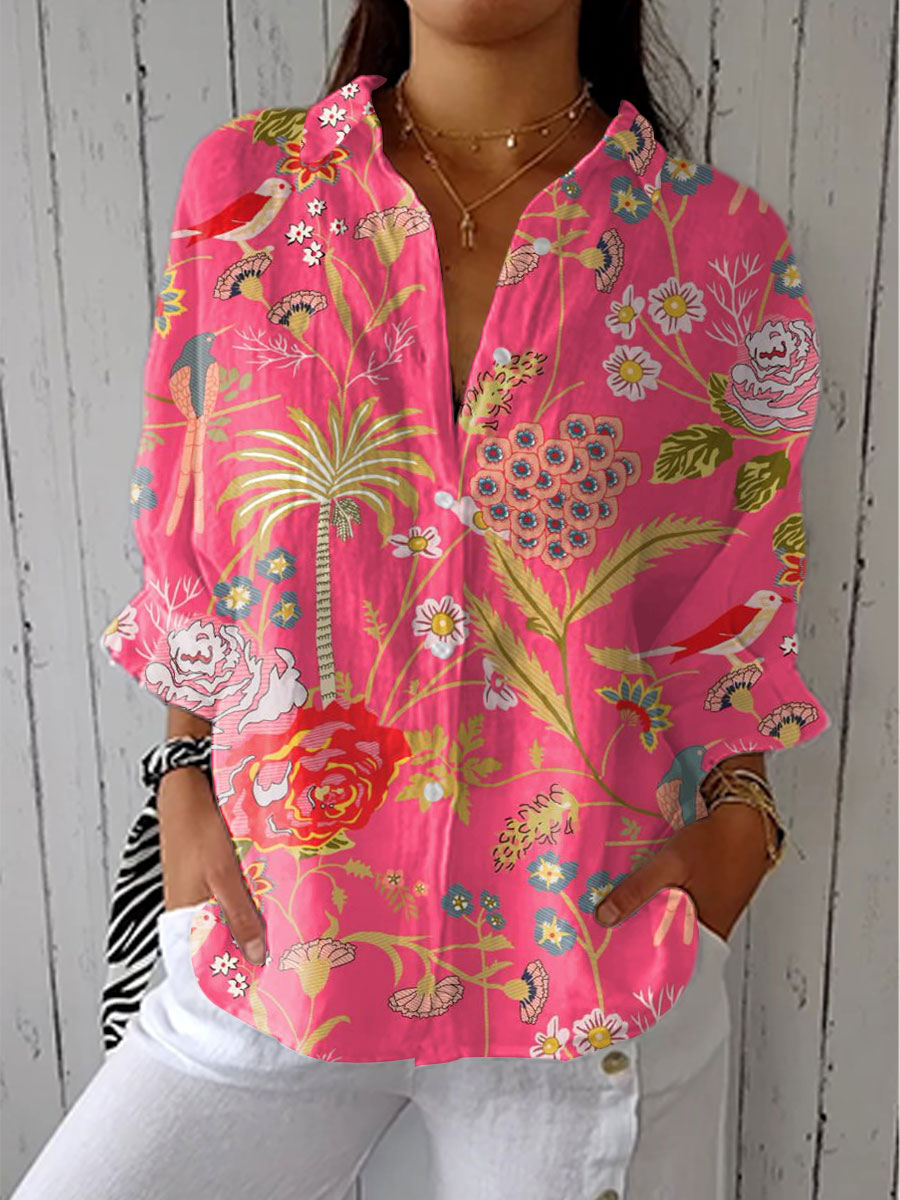 Women's tropical floral print V-neck blouse, vibrant summer fashion, perfect for holidays & resort wear.