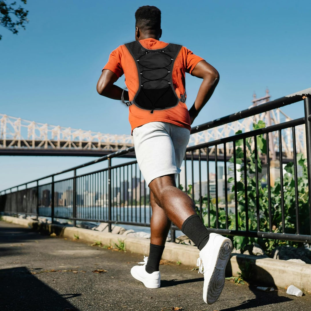Hiking hydration vest, ultra-lightweight, with a 2-liter water bladder for adventurers.