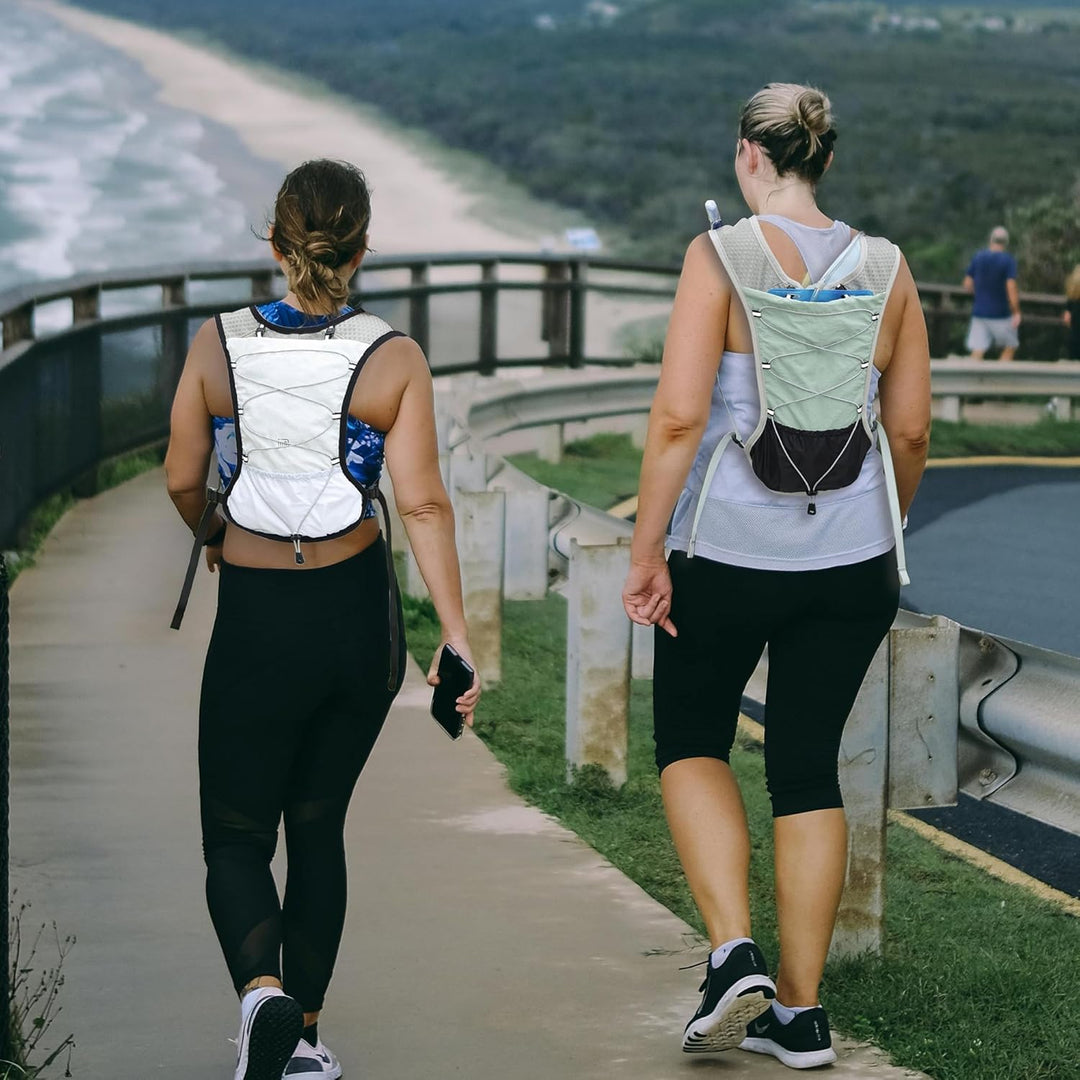 Hydration pack for trail running, cycling, hiking: Ultra-light & 2L capacity.