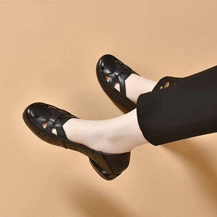 Fashionable women's block heel loafers in a slip-on style, providing elegant and professional footwear.