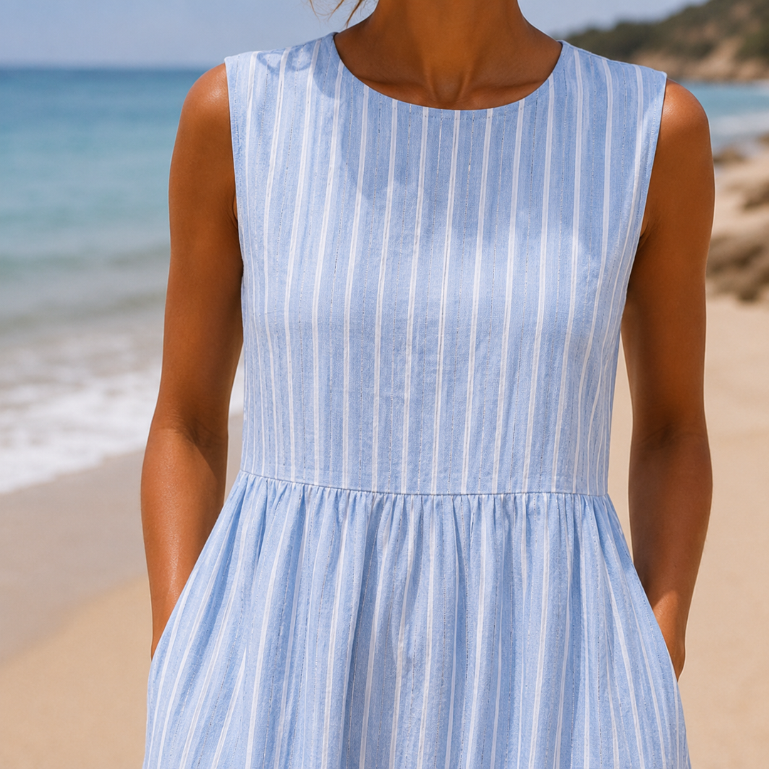 Lightweight women's midi sundress, a perfect vacation dress for warm weather. Sleeveless & effortlessly chic.