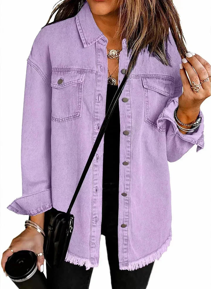 Fall/spring fashion: Women's chic longline denim jacket. Oversized button-down for casual layering.