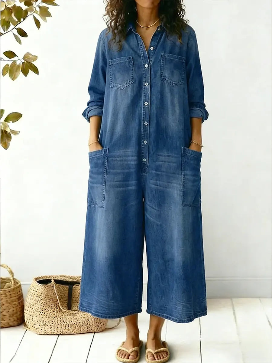Black wide-leg jumpsuit for women, featuring a stylish button-front. Ideal for versatile casual wear & all-day comfort.