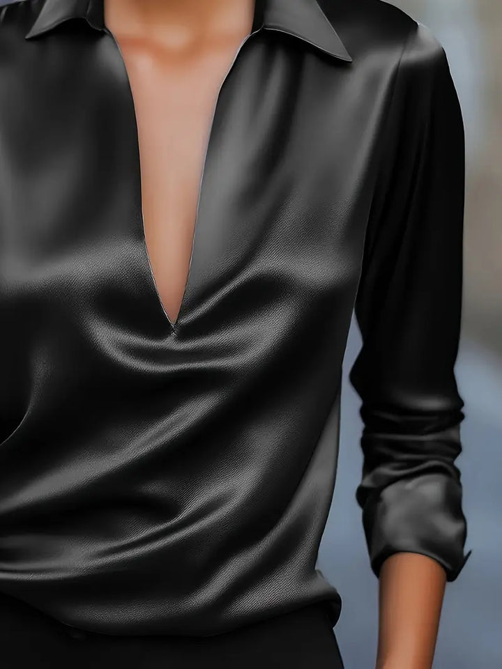 Women's premium V-neck top, flowing fit, long sleeve for versatile and effortless style.