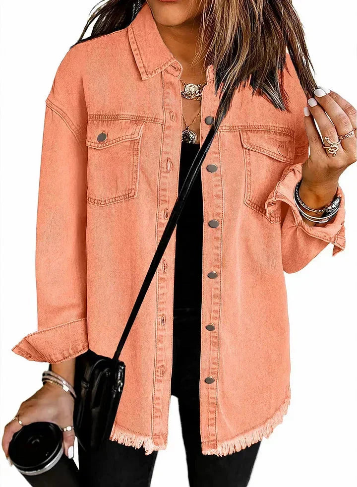 Women's longline denim shacket. Oversized button-down, ideal for casual layering & spring fashion.