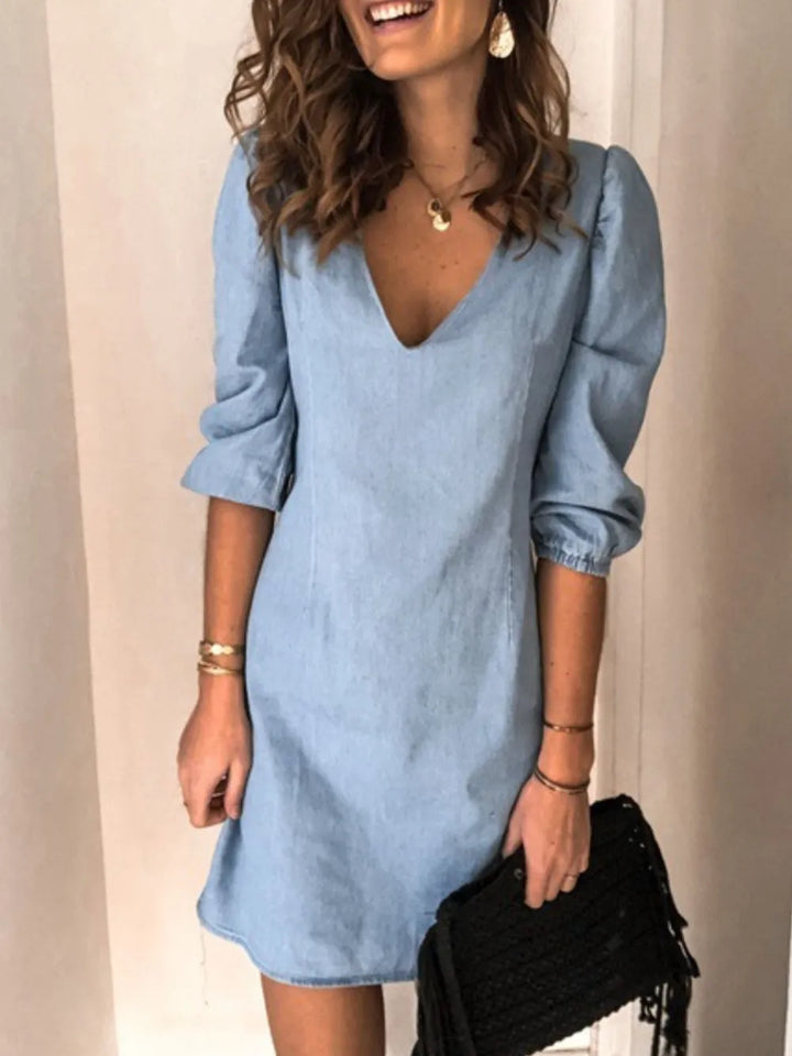 Women's flattering V-neck casual dress with half sleeves, perfect for everyday wear.