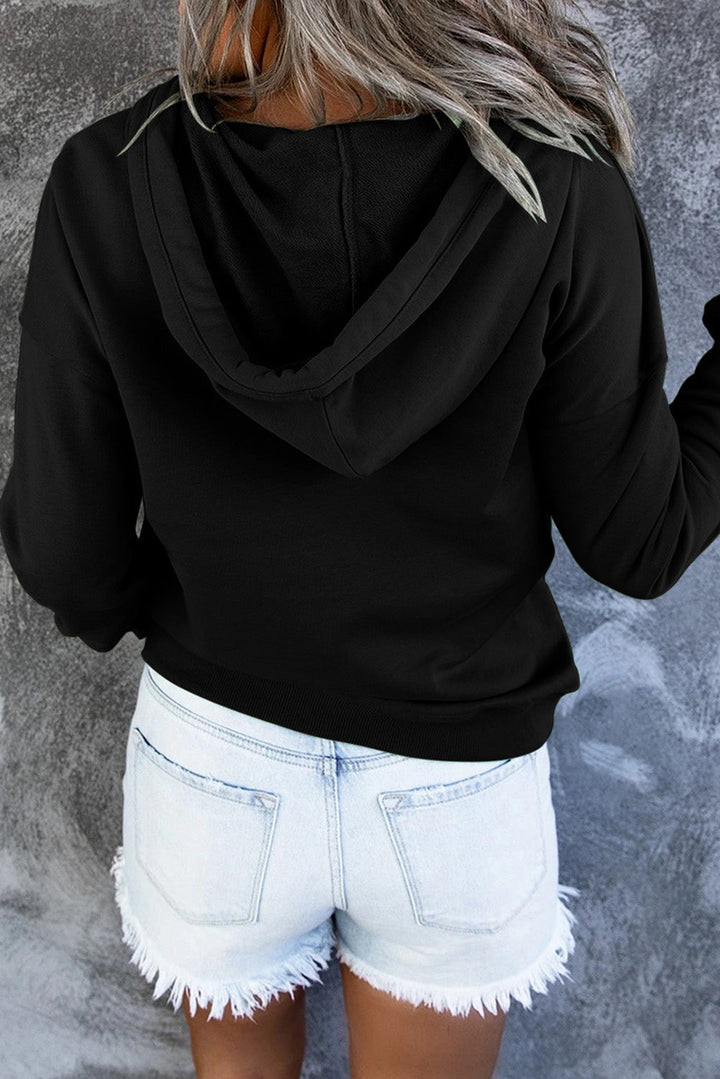 Women's soft-touch hooded pullover, an everyday essential for cozy fashion.