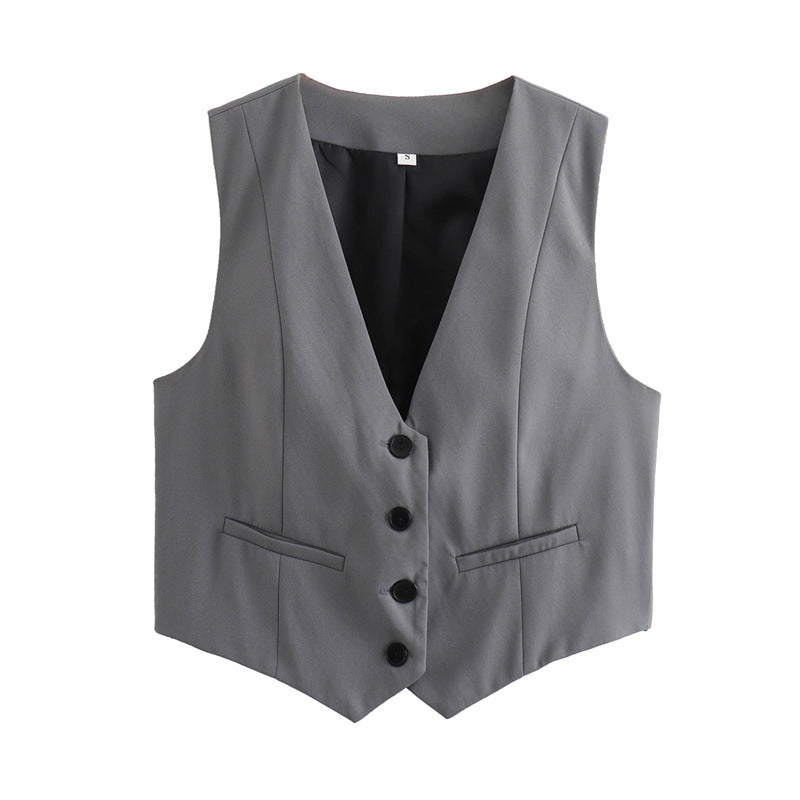 Elegant black tailored vest for women, a sophisticated layering piece for office wear.