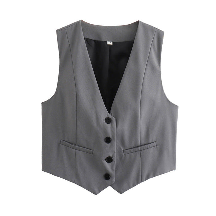 Elegant black tailored vest for women, a sophisticated layering piece for office wear.