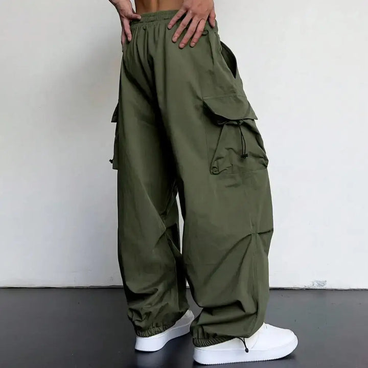 Black men's relaxed fit cargo joggers. Perfect comfortable streetwear for men's casual look.