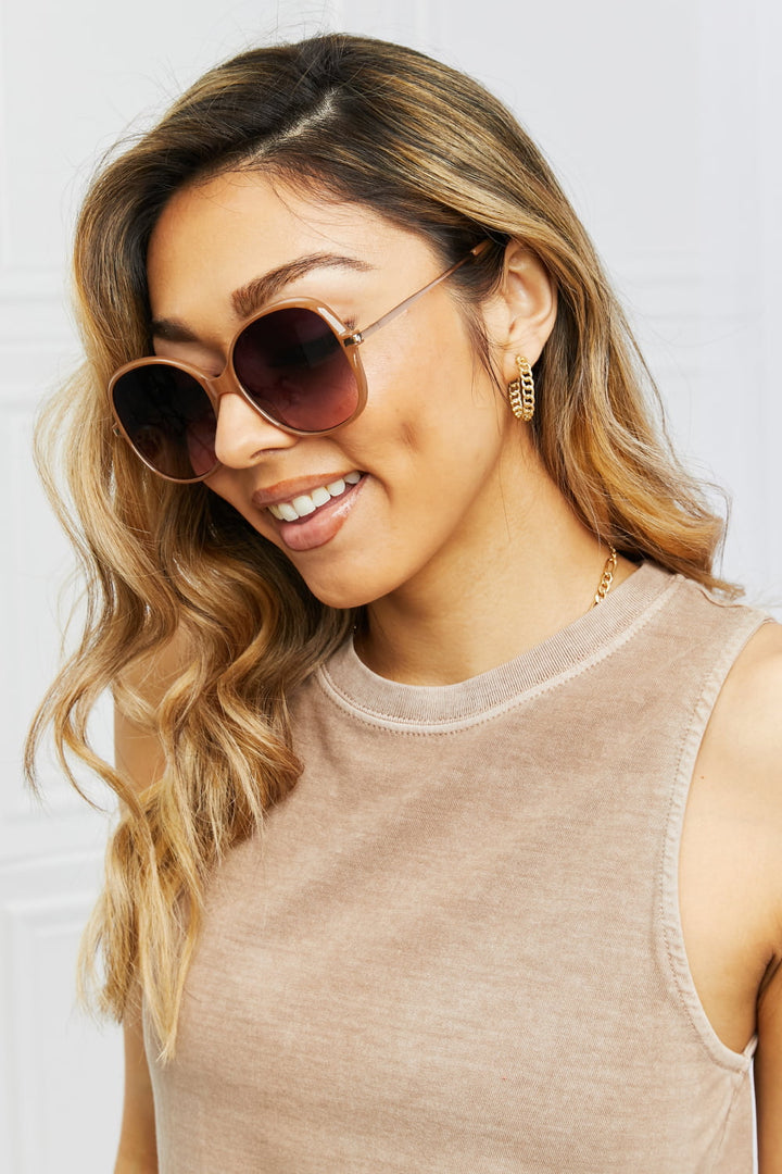 Women's round oversized gradient sunglasses, chic eyewear with crucial UV400 sun protection.
