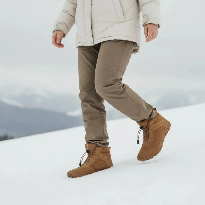 Protective unisex snow boots for cold winter weather, featuring durable design & comfort.