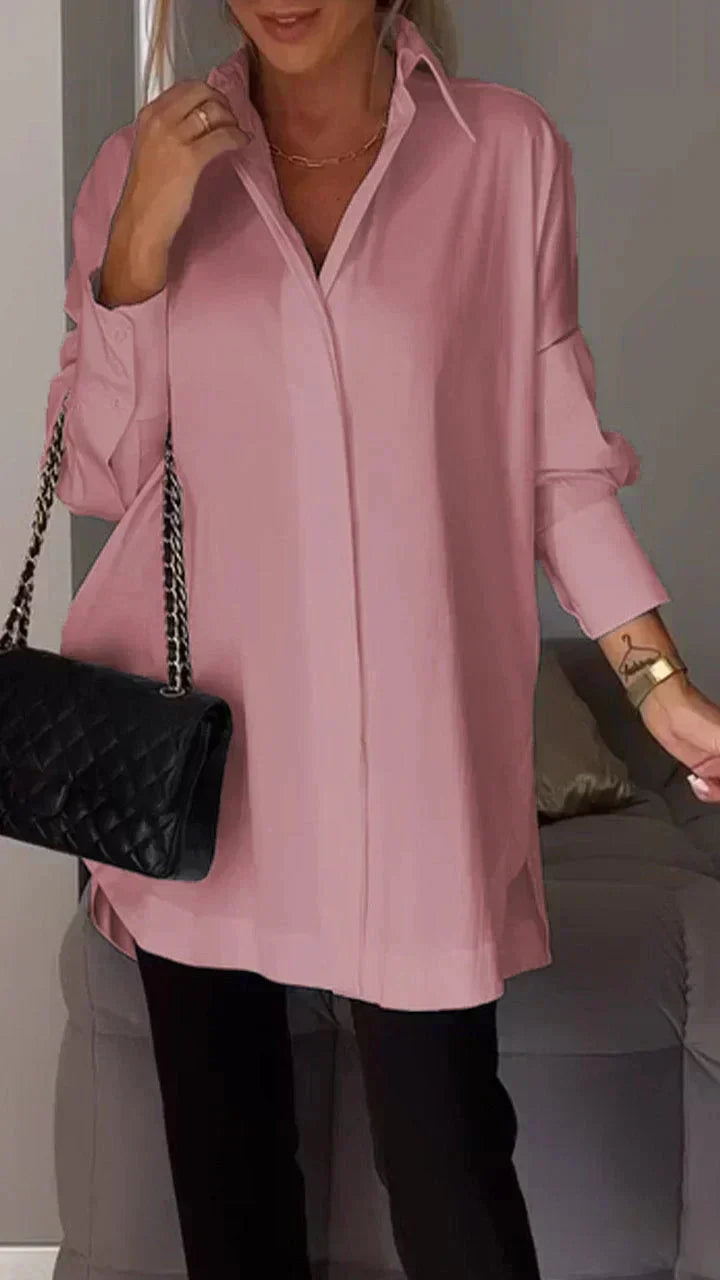 Classic women's oversize blouse, elegant chic design. Comfortable loose fit top for versatile, fashionable styling.