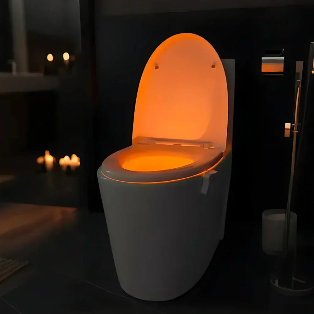 Hands-free motion sensor LED lavatory light. Easy-install, color-changing toilet bowl illuminator for any bathroom.