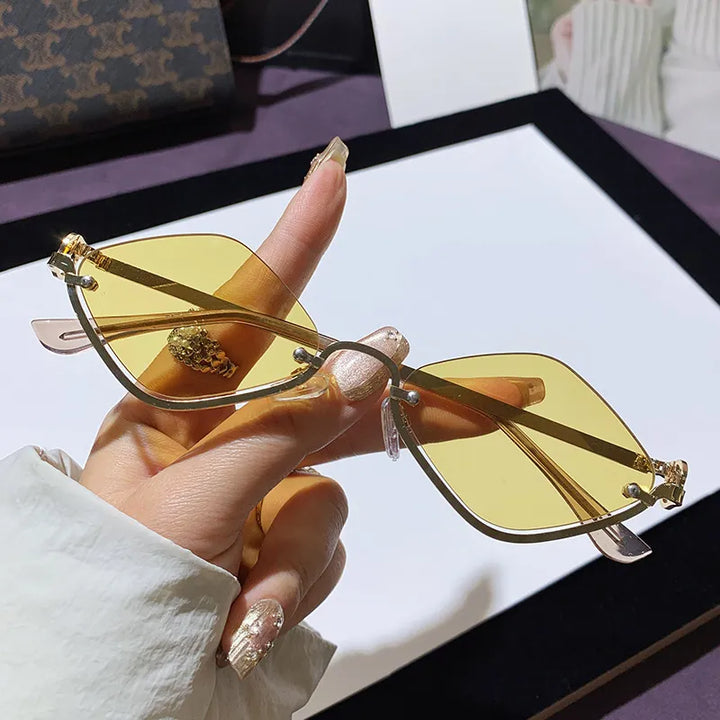 Fashionable women's cat-eye sunglasses with tinted lenses, providing UV400 protection for sunny days.