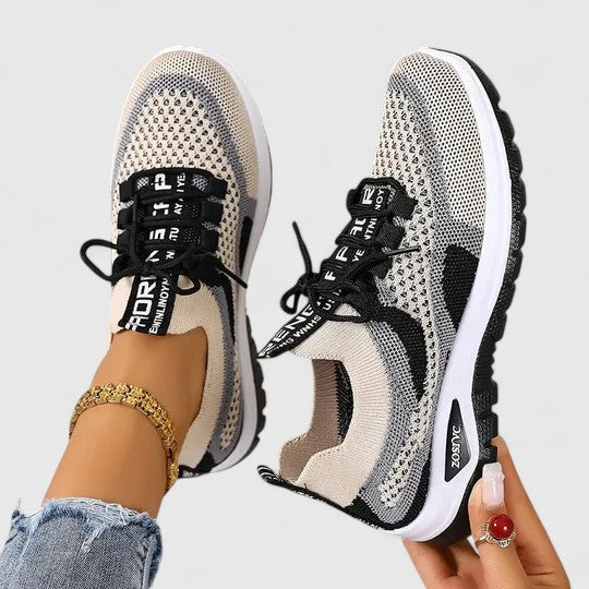 Breathable women's athletic trainers, providing lightweight comfort & essential support for active women.