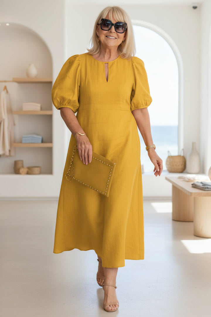 Graceful women's midi summer dress with tummy coverage, a comfortable and elegant choice for any occasion.