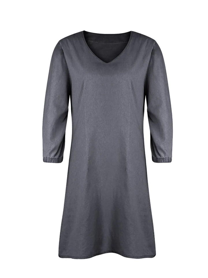 Trendy V-neck casual dress with half sleeves for women, perfect for weekend and office wear.