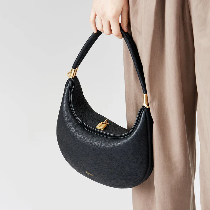 Women's chic everyday handbag with versatile design, perfect as a stylish shoulder or crossbody bag.