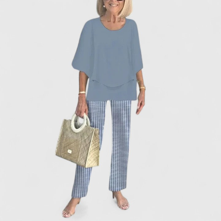 Vibrant butter yellow women's co-ord set. Relaxed fit trousers & top for chic summer wear.